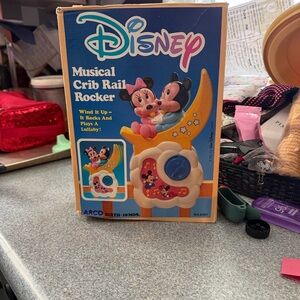 Disney Musical Crib Rail Rocker - Blue and Cream